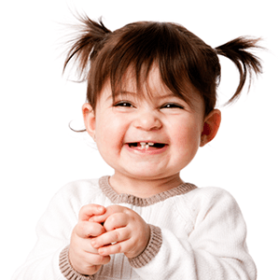 Cute little baby girl smiling at a Preschool & Daycare/Childcare Center serving Apex & Fuquay-Varina, NC