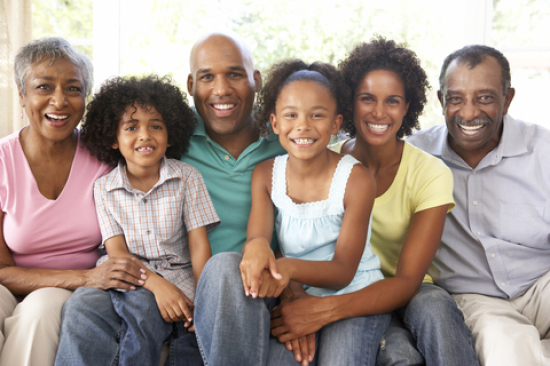 African American family picture at a Preschool & Daycare/Childcare Center serving Apex & Fuquay-Varina, NC