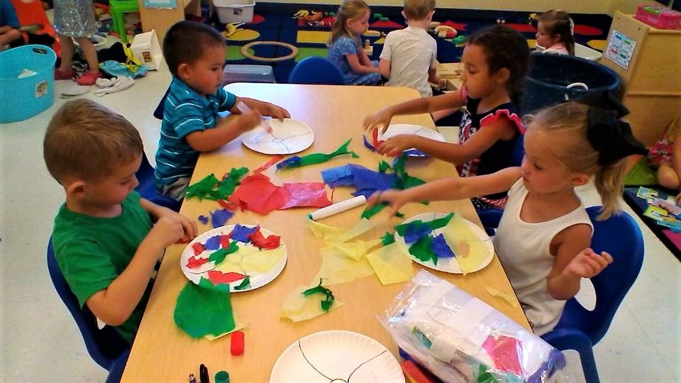 Preschool kids exploring creativity at a Preschool & Daycare/Childcare Center serving Apex & Fuquay-Varina, NC